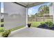 Covered patio overlooks backyard with privacy fence and shade at 145 Woodbrook Way, Moncks Corner, SC 29461