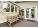 Inviting back porch with comfortable seating and view of the exterior at 1511 Fairway Dr, Charleston, SC 29412