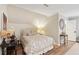 Bedroom featuring a large bed with decorative pillows and neutral walls at 1511 Fairway Dr, Charleston, SC 29412