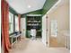 Bright office with custom built-in shelving and desk at 1511 Fairway Dr, Charleston, SC 29412