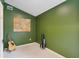 Empty room with olive green walls, waiting to be turned into something special at 1511 Fairway Dr, Charleston, SC 29412