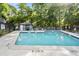 Sparkling community pool surrounded by lush greenery and comfortable seating at 1530 Fort Johnson Rd # 1L, Charleston, SC 29412