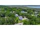 Scenic aerial view of the house nestled among lush greenery and close to the water at 1577 Periwinkle Dr, Mount Pleasant, SC 29466