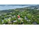 Stunning aerial view of a waterfront community with lush green trees surrounding homes at 1577 Periwinkle Dr, Mount Pleasant, SC 29466