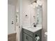 Bathroom features a gray vanity, a white countertop, and modern fixtures at 1577 Periwinkle Dr, Mount Pleasant, SC 29466