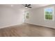 Open bedroom with hardwood floors, and an entrance to a closet at 1577 Periwinkle Dr, Mount Pleasant, SC 29466