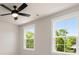 Bedroom featuring modern ceiling fan and two large windows at 1577 Periwinkle Dr, Mount Pleasant, SC 29466