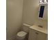 Bathroom featuring a sink vanity with a mirror, and a standard toilet at 1601 Westmoreland Ave, Charleston, SC 29412