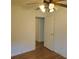 Bedroom featuring hardwood floors, ceiling fan, doorway, and electrical outlets at 1601 Westmoreland Ave, Charleston, SC 29412