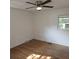 Bedroom with hardwood floors, ceiling fan and natural light from the window at 1601 Westmoreland Ave, Charleston, SC 29412