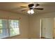 Bedroom with hardwood floors, fan, and windows that provide natural light at 1601 Westmoreland Ave, Charleston, SC 29412