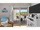 Relaxing balcony featuring a seating area, natural light, and serene outdoor views, perfect for unwinding at 1627 Live Oak Park, Seabrook Island, SC 29455