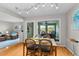 Bright dining area next to the living room, enhanced by natural light and an inviting atmosphere for meals at 1627 Live Oak Park, Seabrook Island, SC 29455