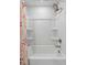 Bright bathroom with a shower and tub combo with floral shower curtain at 174 Red Bluff St, Summerville, SC 29483