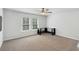 Neutral-toned bedroom with ceiling fan and carpet flooring at 174 Red Bluff St, Summerville, SC 29483