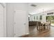 Open-concept dining area with hardwood floors and plenty of natural light at 174 Red Bluff St, Summerville, SC 29483