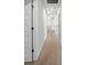 Hallway with neutral carpet and white walls that leads to other rooms at 174 Red Bluff St, Summerville, SC 29483