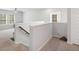 Hallway with carpet flooring and stair railing at 174 Red Bluff St, Summerville, SC 29483