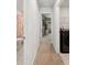 Hallway view into bedroom, bathroom, and laundry area with appliances at 174 Red Bluff St, Summerville, SC 29483