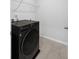Modern, front loading LG washer/dryer and built-in shelving at 174 Red Bluff St, Summerville, SC 29483