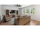 Cozy living room with neutral tones, hardwood floors, and comfortable furniture at 174 Red Bluff St, Summerville, SC 29483