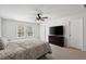 Bedroom with bed, dresser, ceiling fan, and bright windows at 174 Red Bluff St, Summerville, SC 29483