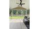 Screened in patio with ceiling fan and backyard views at 174 Red Bluff St, Summerville, SC 29483