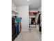 Walk-in closet featuring ample hanging space and shelves, perfect for organization and storage at 174 Red Bluff St, Summerville, SC 29483