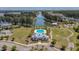 Amazing aerial view showcasing the community's pool, lawns, landscaping and the tranquil pond it surrounds at 183 Calm Water Way, Summerville, SC 29486