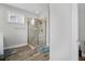 Modern bathroom featuring a glass-enclosed shower with tile surround, creating a clean and contemporary space at 183 Calm Water Way, Summerville, SC 29486