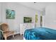 Spacious bedroom with a view of a tv, with blue bedspread and natural lighting at 183 Calm Water Way, Summerville, SC 29486