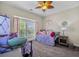 Charming bedroom featuring twin beds, gray carpet, and a lovely window view at 183 Calm Water Way, Summerville, SC 29486