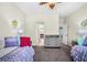 Bright bedroom featuring two twin beds, dresser, and gray carpet at 183 Calm Water Way, Summerville, SC 29486