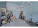 Well-organized garage space with overhead rack storage and epoxy floors at 183 Calm Water Way, Summerville, SC 29486