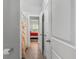 Hallway leading to bedroom, tiled floor, and multiple doors at 183 Calm Water Way, Summerville, SC 29486