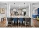 Modern kitchen featuring gray cabinets, stainless steel appliances, granite countertops and eat in bar at 183 Calm Water Way, Summerville, SC 29486