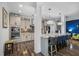 Modern kitchen featuring gray cabinets, stainless steel appliances, granite countertops and eat in bar at 183 Calm Water Way, Summerville, SC 29486