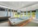 Inviting spa area with a large hot tub and ample natural light, perfect for relaxation and enjoyment at 183 Calm Water Way, Summerville, SC 29486