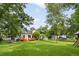 Spacious backyard with a deck, outdoor kitchen, and plenty of room for outdoor activities at 19 Avondale Ave, Charleston, SC 29407