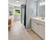 Bathroom featuring single sink vanity, tiled flooring, and built in storage at 19 Avondale Ave, Charleston, SC 29407