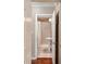 The bathroom boasts neutral tile and a pedestal sink at 19 Avondale Ave, Charleston, SC 29407