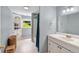 Bathroom featuring single sink vanity, tiled flooring, and built in storage at 19 Avondale Ave, Charleston, SC 29407