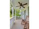 Relaxing front porch with fan and rocking chair at 19 Avondale Ave, Charleston, SC 29407
