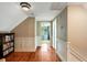 Hallway showcases hardwood floors and lots of natural light at 19 Avondale Ave, Charleston, SC 29407
