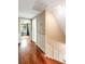 Hardwood floors lead to rooms with a staircase and transom window at 19 Avondale Ave, Charleston, SC 29407
