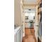 Hallway view into Kitchen with modern range at 19 Avondale Ave, Charleston, SC 29407
