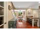 Inviting living room showcasing hardwood floors, staircase, and dining area at 19 Avondale Ave, Charleston, SC 29407