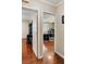 Home office features a black desk, chair, and hardwood floors at 19 Avondale Ave, Charleston, SC 29407