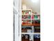 Well-organized pantry with abundant shelving and storage solutions for optimal kitchen organization at 19 Avondale Ave, Charleston, SC 29407