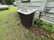 Close up of the exterior AC unit on the side of the home at 2200 State Road Rd, Summerville, SC 29486